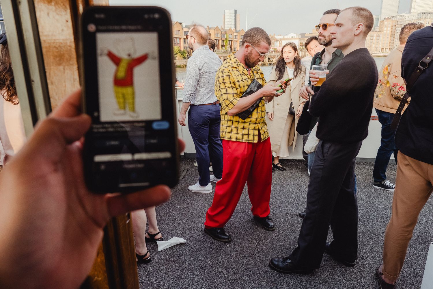 A group of people dancing together in a social dance class setting.