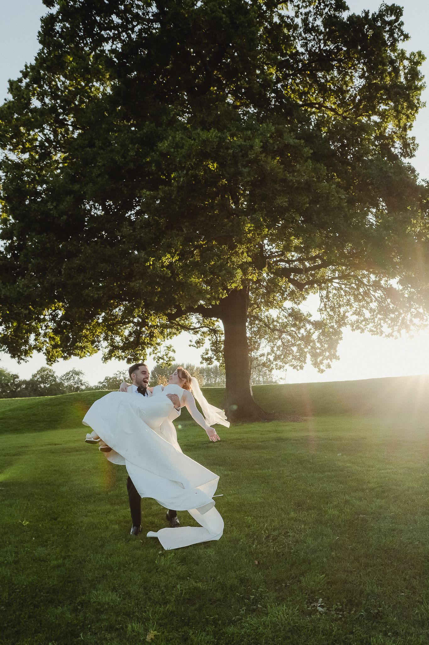 A series of levitation photos showing a person in white clothing floating in a grassy field at sunset.
