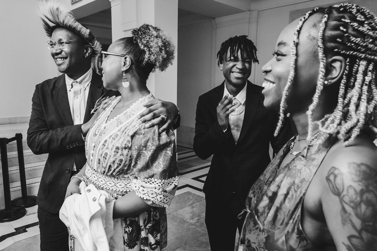 Black and white wedding photo collage showing joyful candid moments during a celebration.