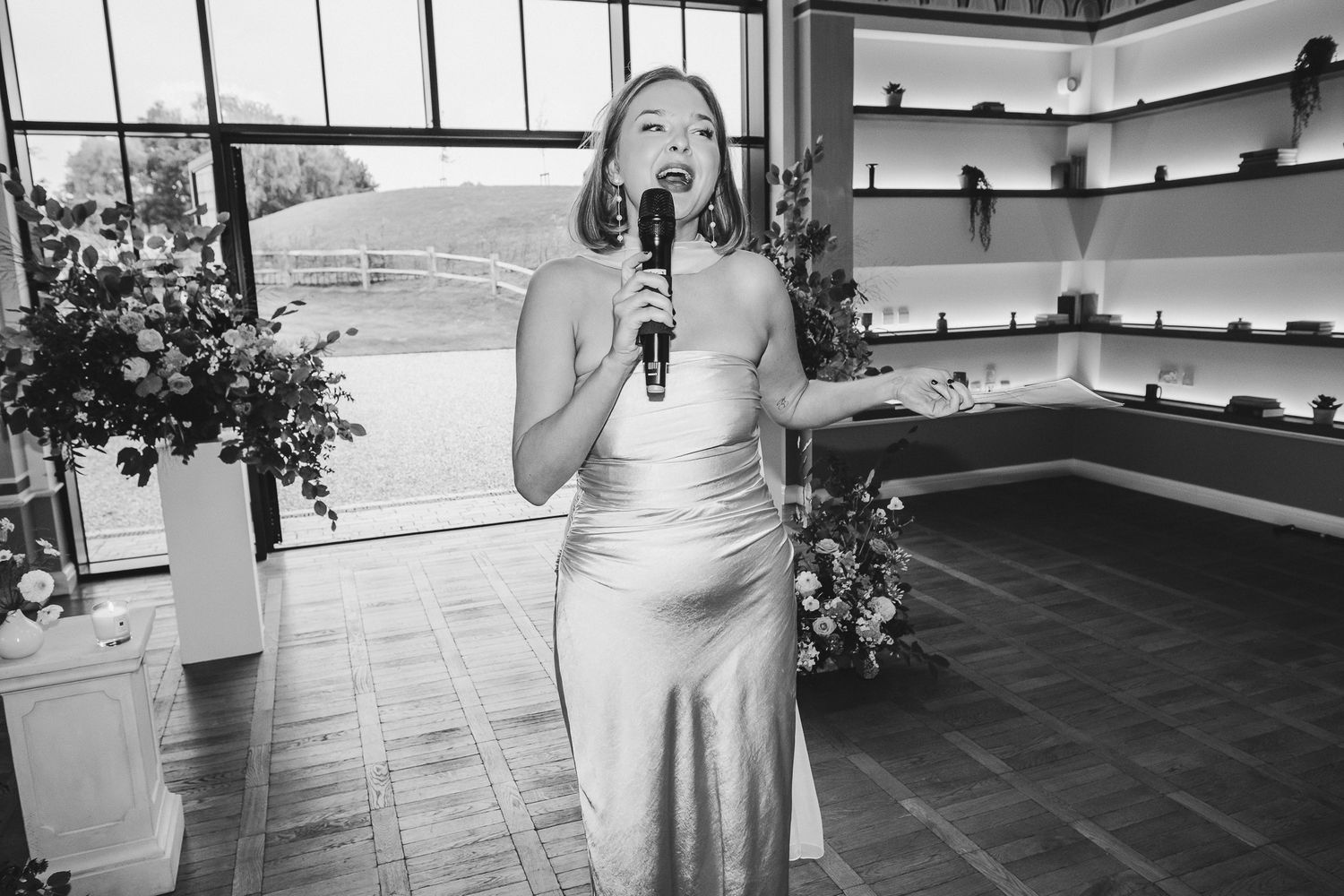 A series of black and white photographs showing people dancing at a wedding reception.