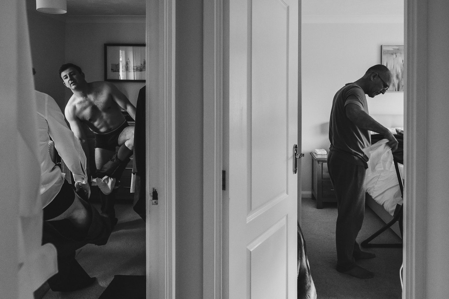 A black and white montage of multiple figures in different doorways depicting a sense of mystery and movement.