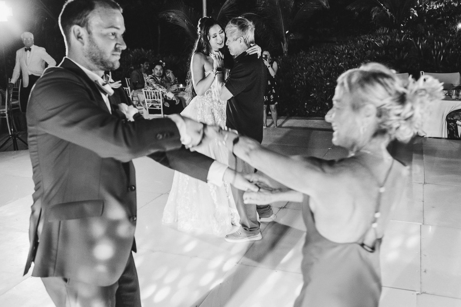A series of black and white photos showing couples dancing together at a formal event.