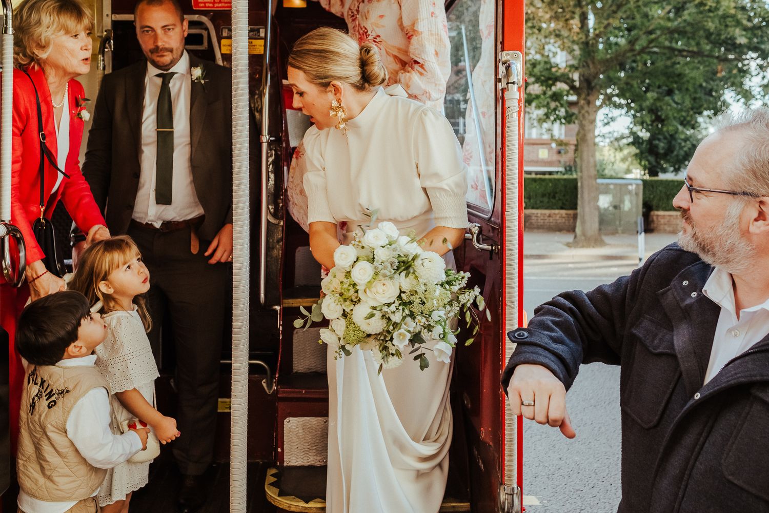 A vintage-inspired wedding montage showing intimate moments during a ceremony and reception in warm tones.