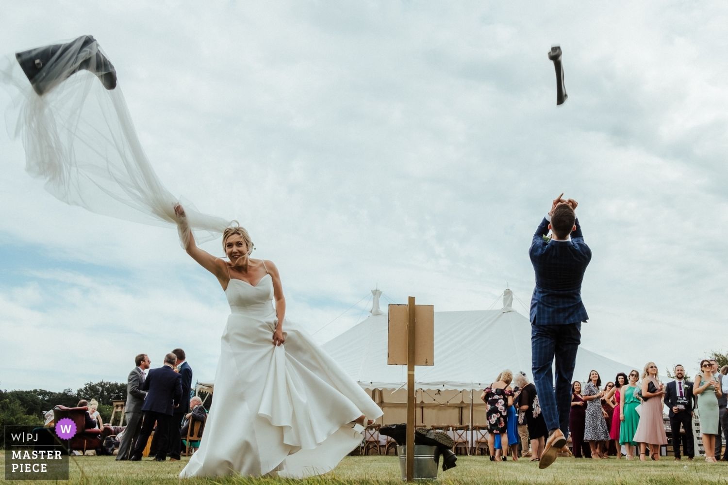 A sequence of wedding photos showing guests and celebrations on a cloudy day outdoors with rolling hills in the background.