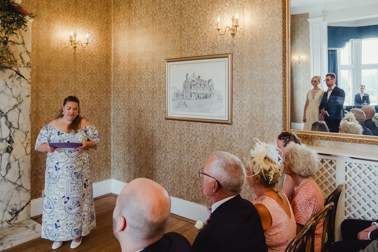 A series of wedding ceremony photos showing guests seated in an elegant room with ornate wallpaper and chandeliers.
