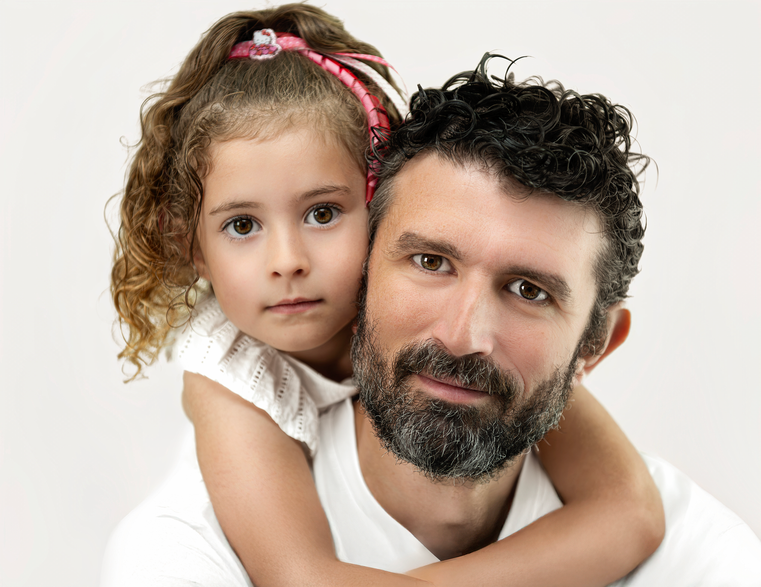 A series of three connected portraits showing a parent and child with curly hair against a white background.
