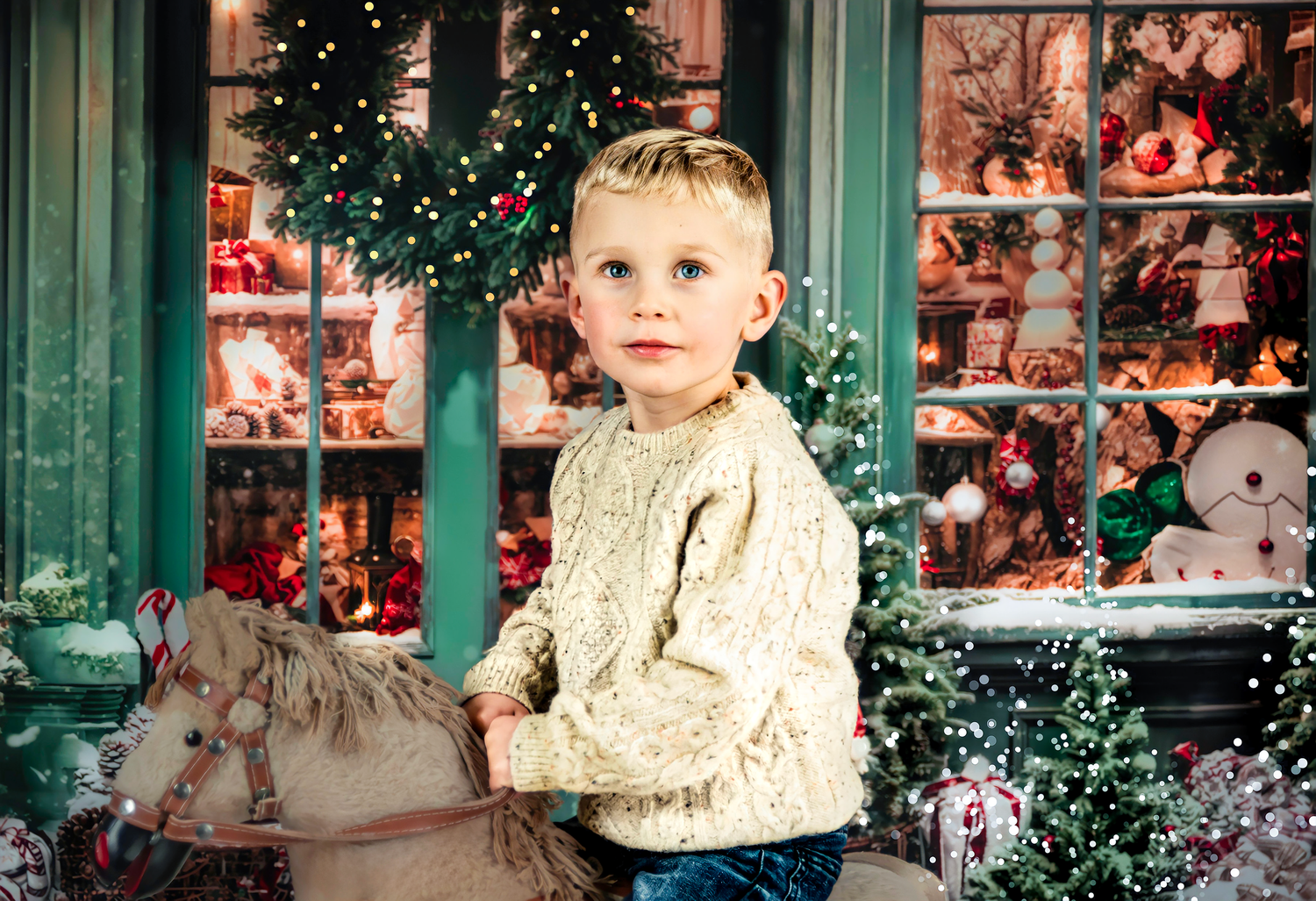 Holiday scene with decorated evergreen wreaths and Christmas decorations in storefront windows.
