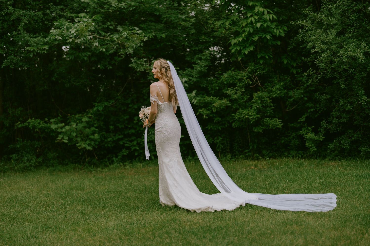 Bride photographed in serene natural landscape near Oshawa, serving Toronto, Durham Region, and destination weddings