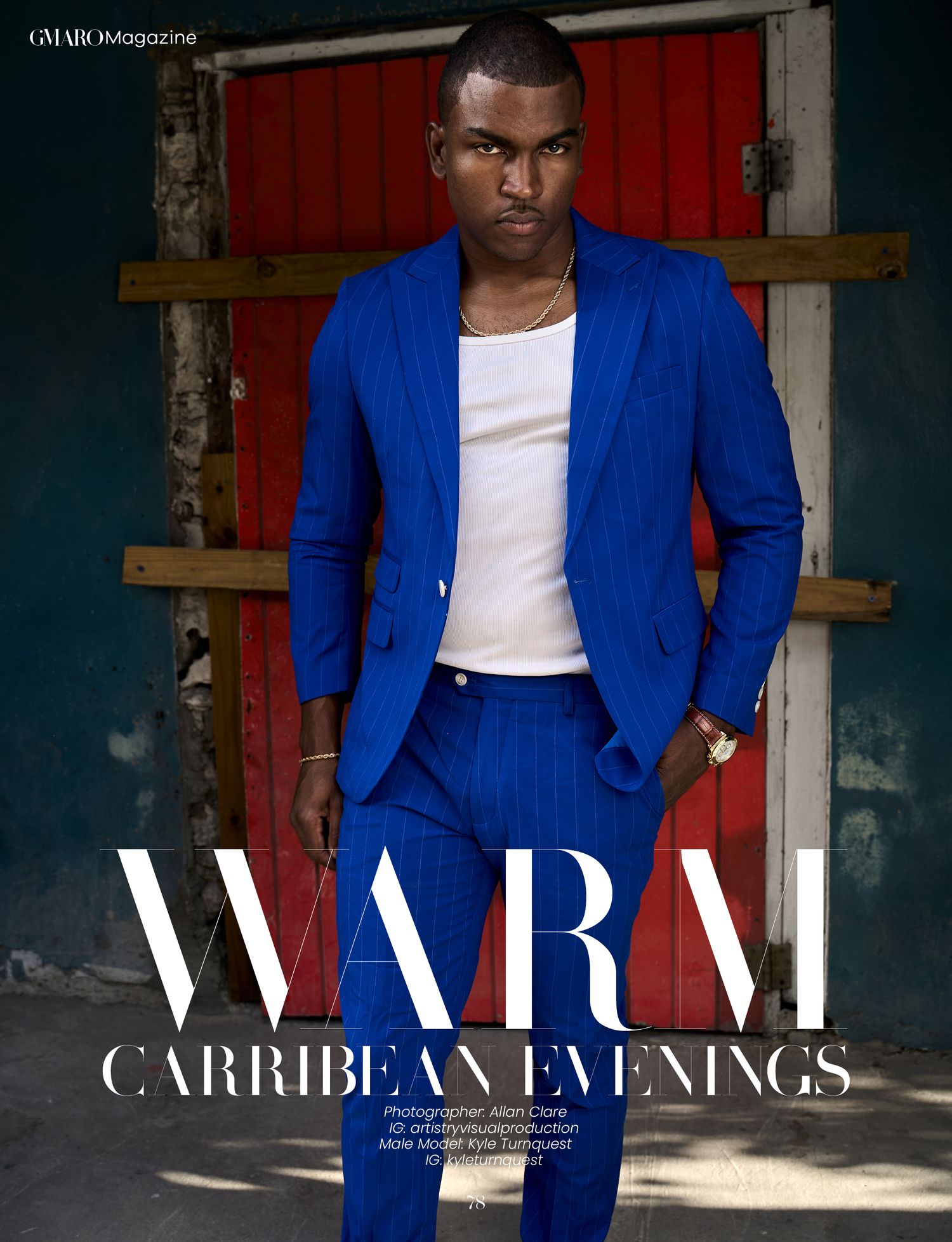 A male model poses in a bold royal blue suit for GMARK Magazine Warm Caribbean Evenings editorial.