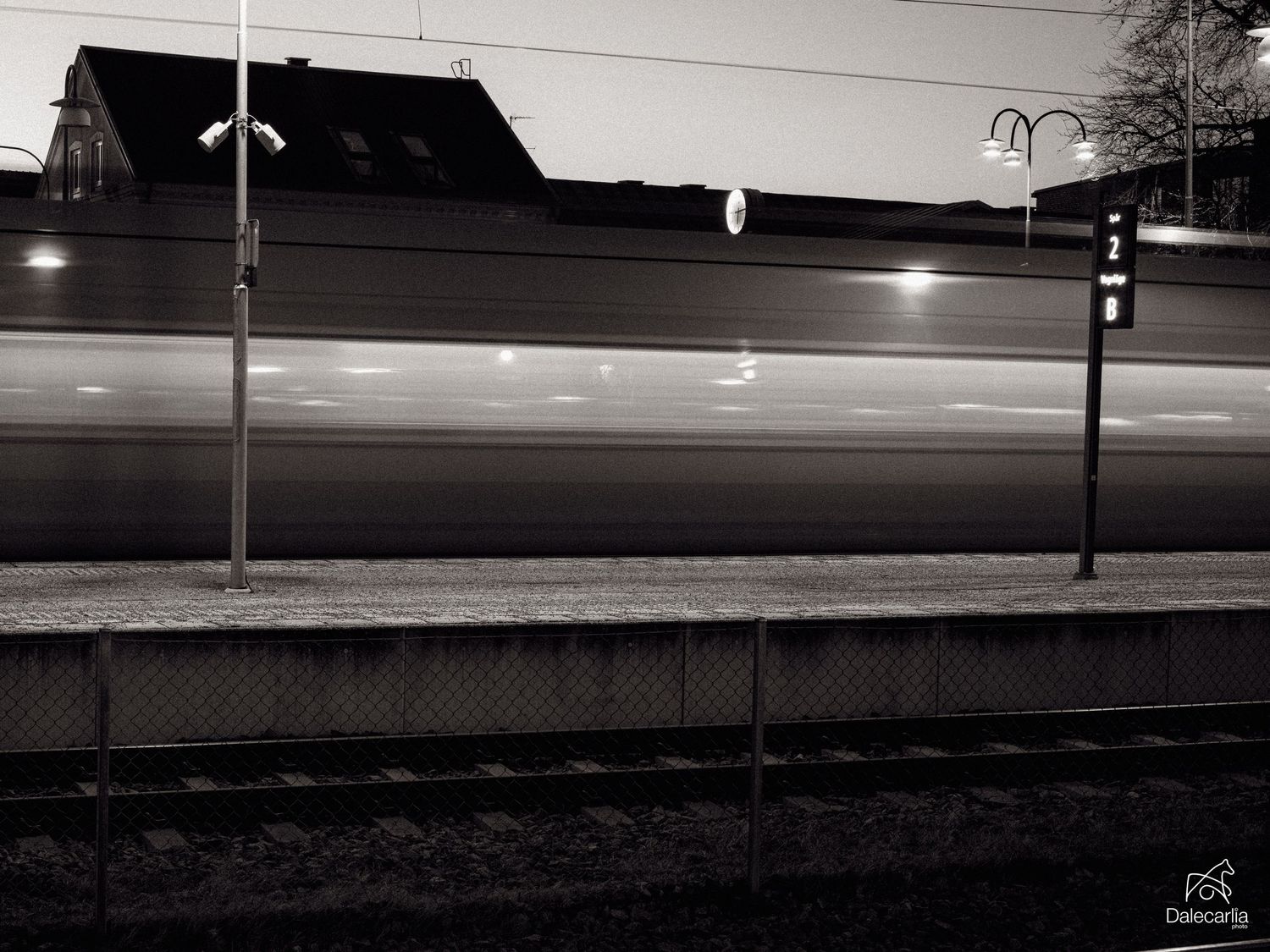 A series of black and white landscape photographs showing a dark horizon line against a lighter sky.