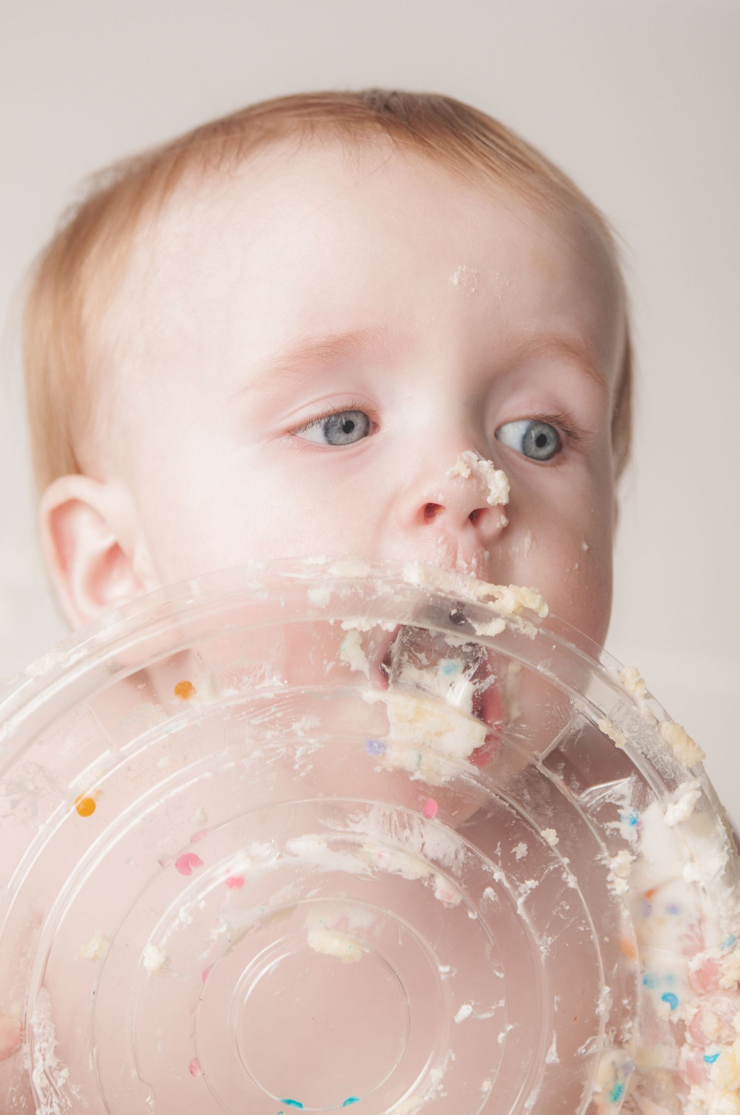 Close-up sequence showing messy cake smash with white frosting and sprinkles. Smash Cake Franklin KY Bowling Green KY Auburn KY