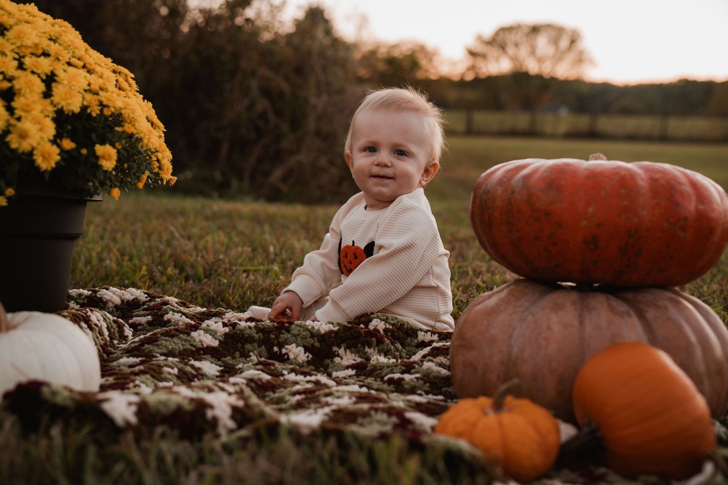 Fall outdoor photography session with pumpkins and autumn leaves at golden hour. Fall Photos bowling green, ky; milestone photos SOKY