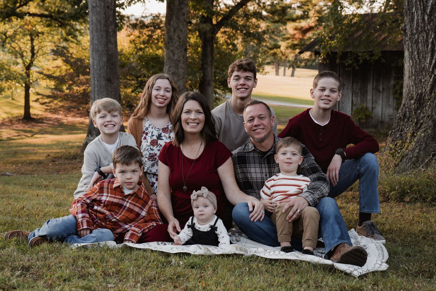Family portrait session outdoors with fall foliage and natural lighting. Outdoor Family Photos SOKY Hobson Grove Bowling Green ky