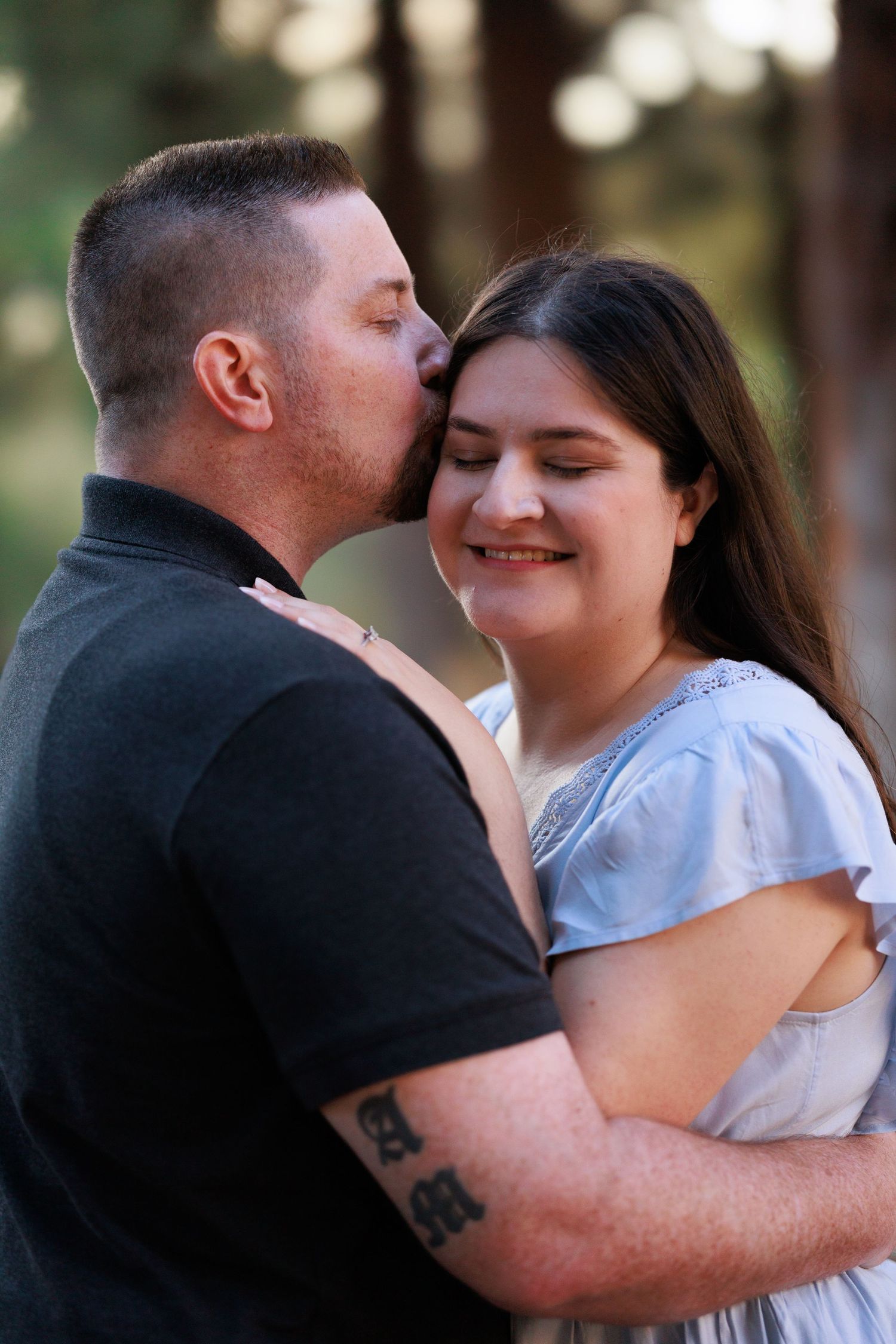 A couple showing affection at Carbon Canyon in Brea, California