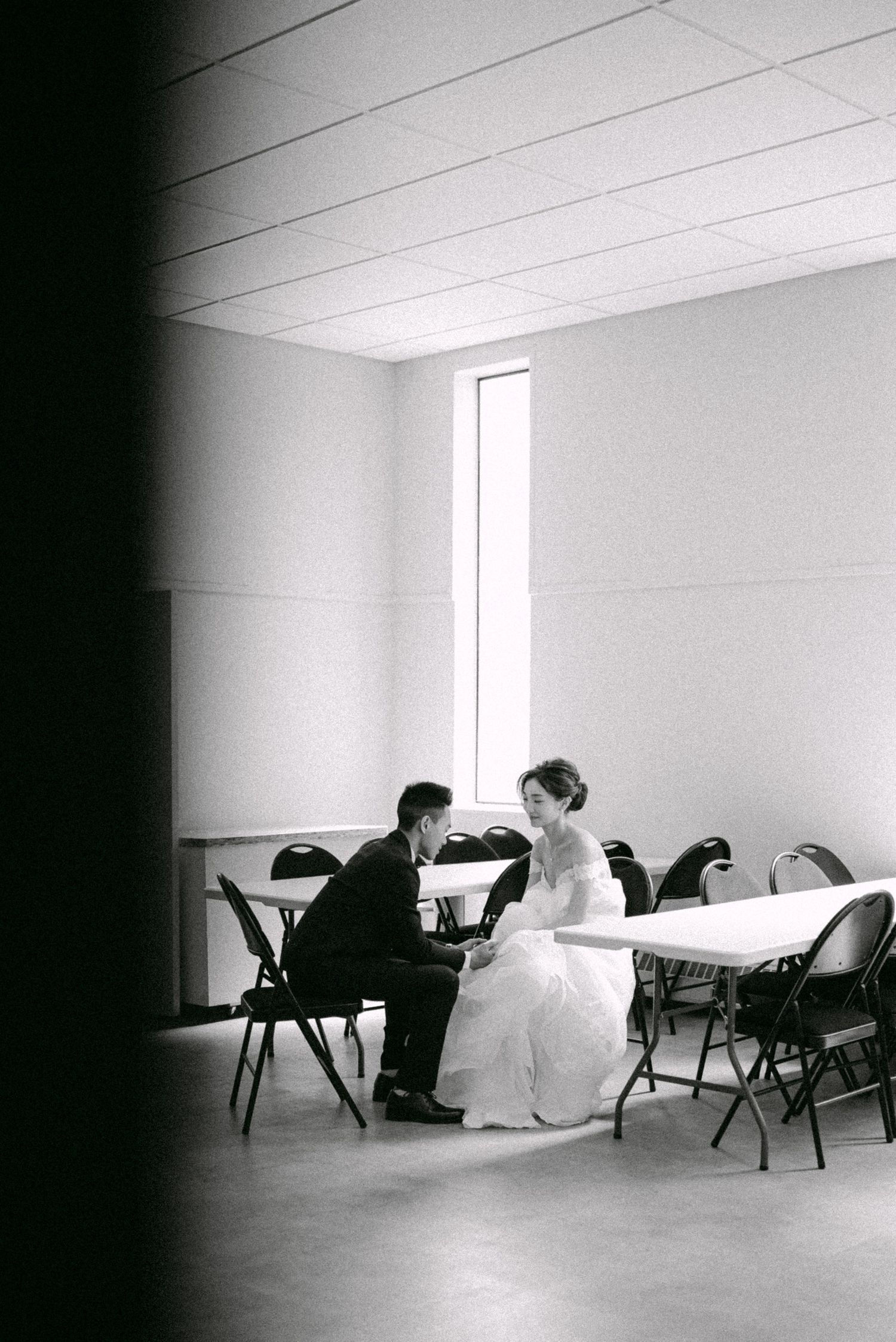 Bride and groom prays quietly before the ceremony. Vancouver wedding by Victor Li Photography.