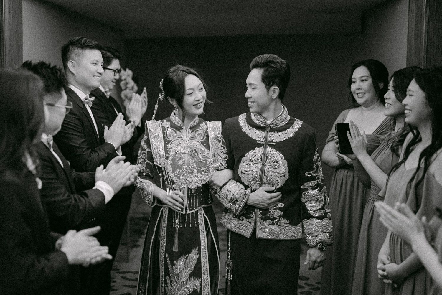 Bride and groom in traditional Chinese wedding attire. Vancouver wedding by Victor Li Photography.