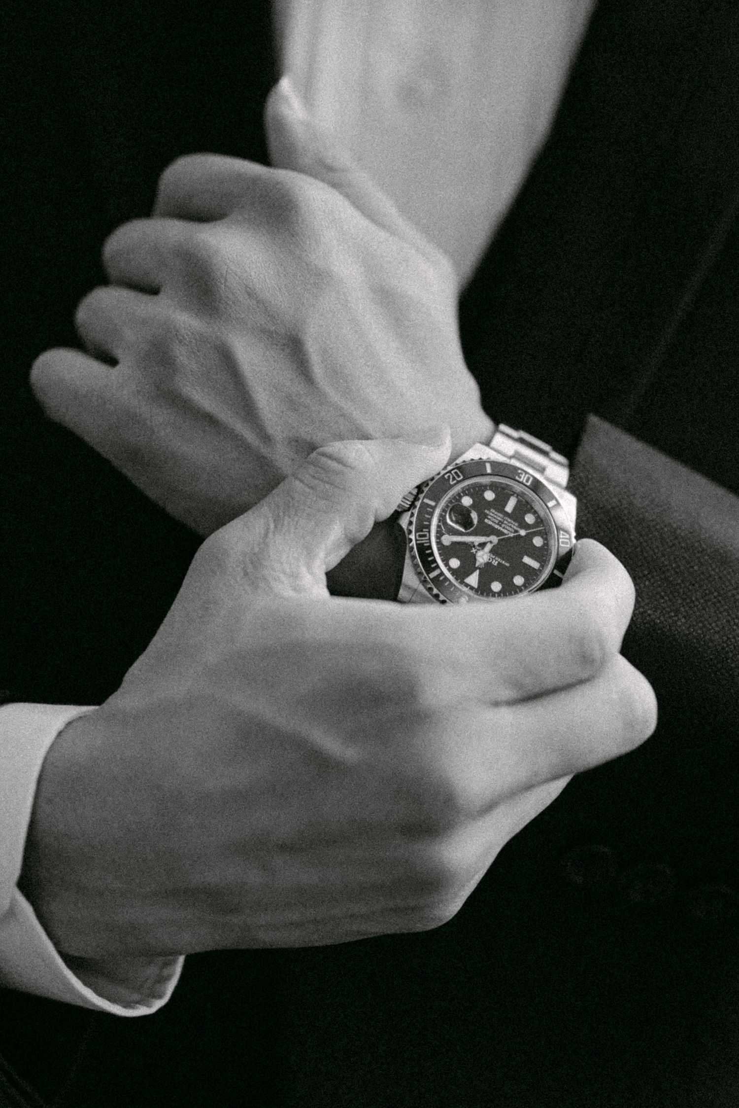 Close-up of groom's watch. Vancouver wedding by Victor Li Photography.