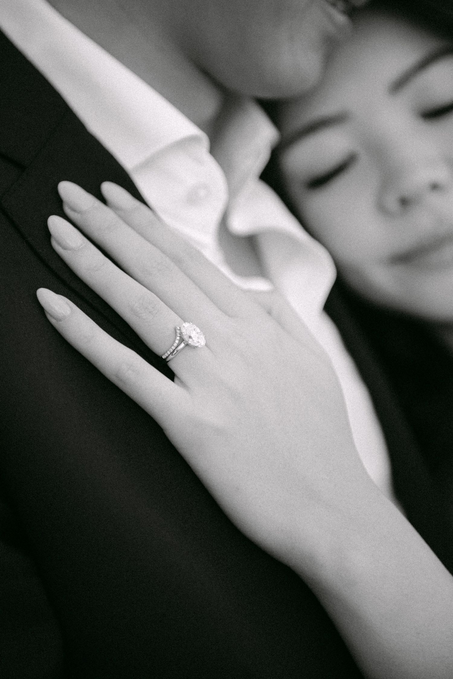 Close-up of ring and hand on shoulder. Vancouver prewedding and engagement by Victor Li Photography.