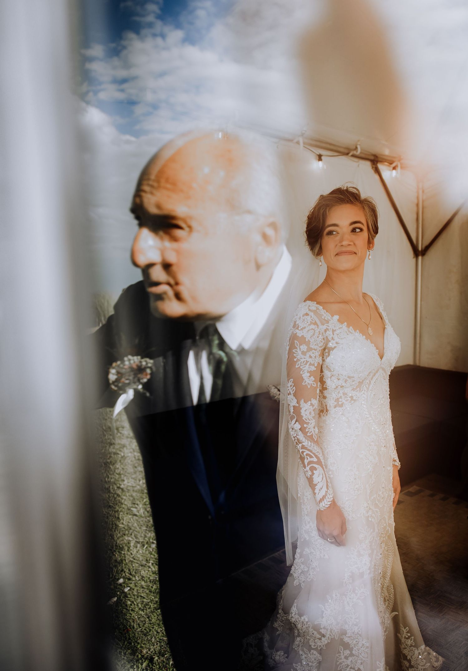 Artistic wedding photography with soft focus and natural light creating dreamy bridal portraits.
