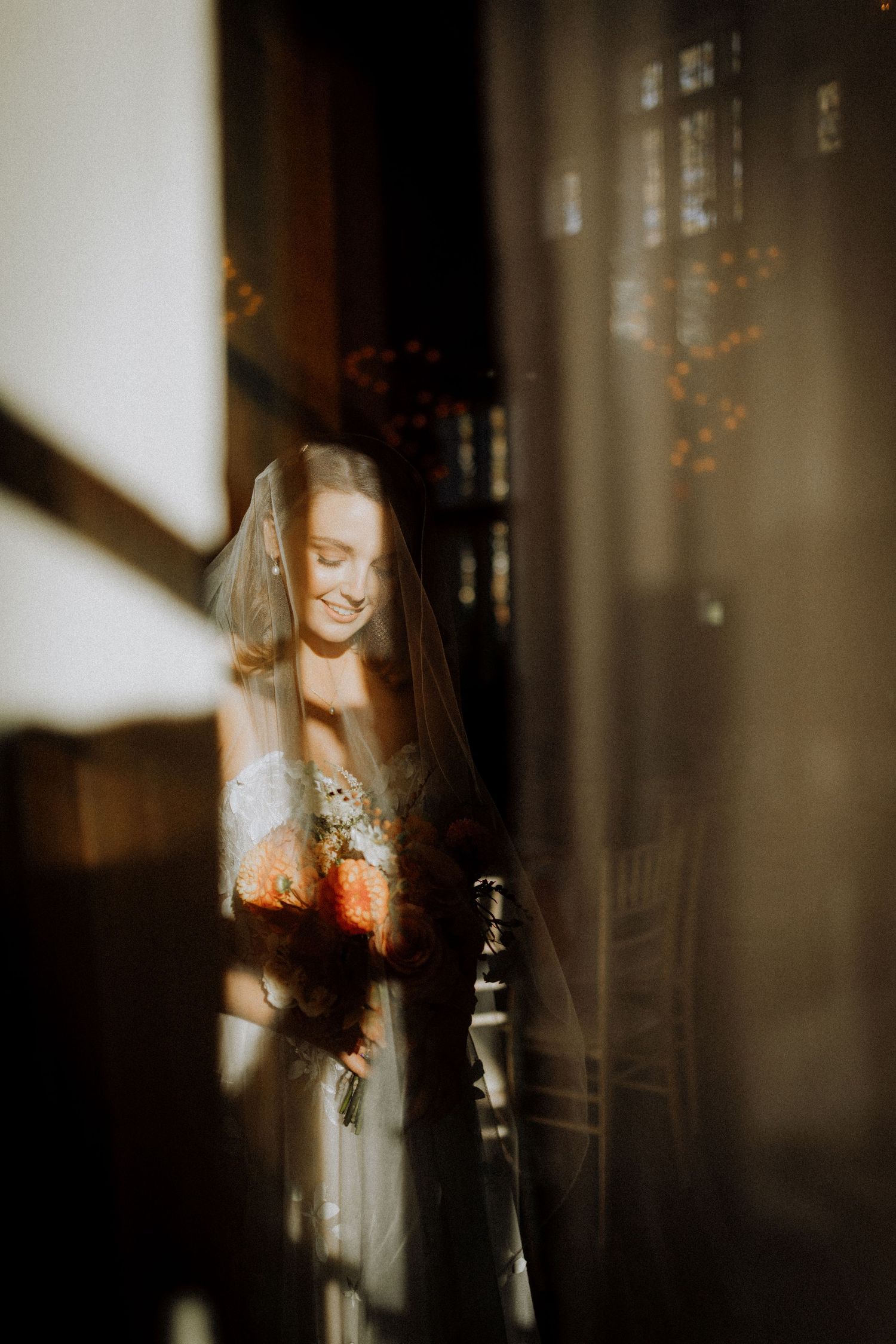Moody wedding photography sequence with warm lighting and crystal decorations.