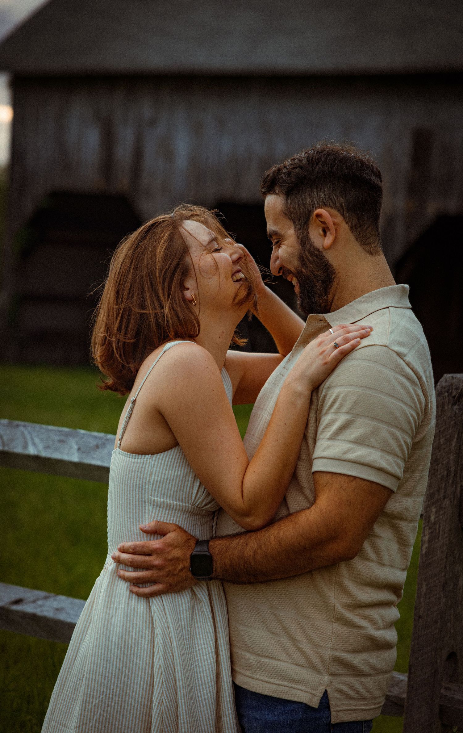 Intimate moment between couple dancing in casual attire.