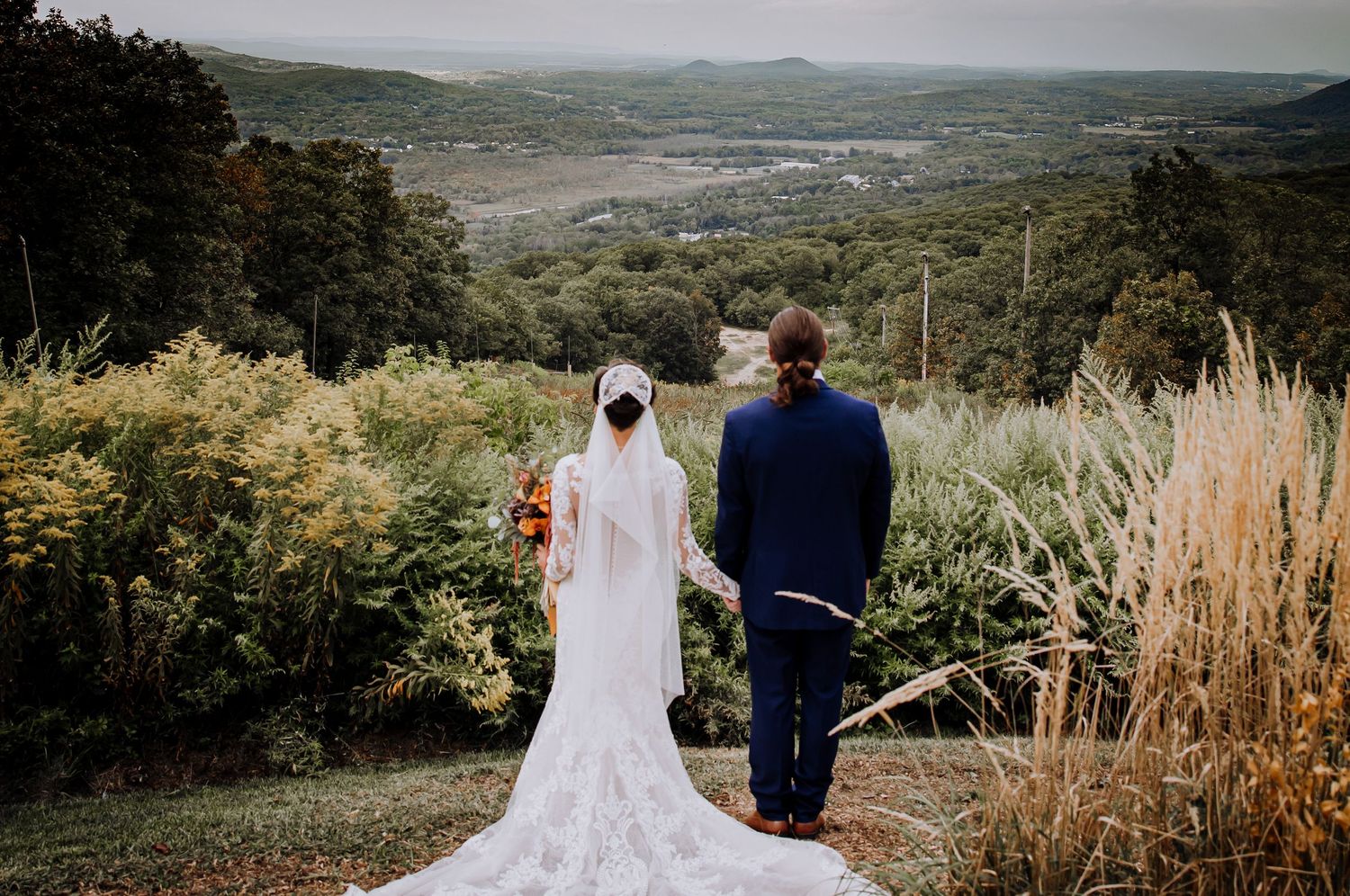 Panoramic landscape view of rolling hills and countryside from a wedding venue.