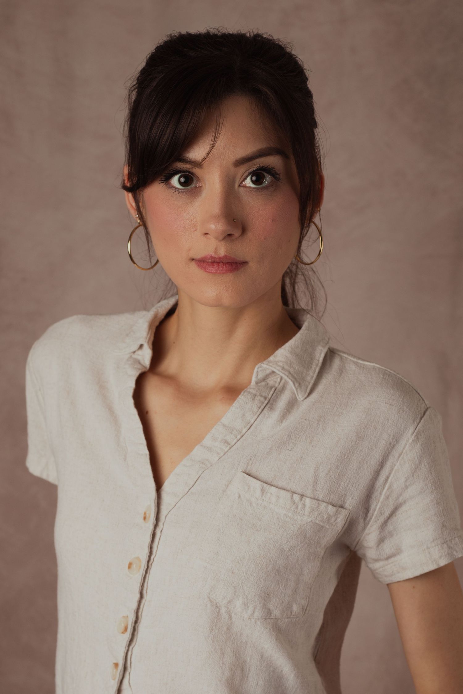 Female model posing in elegant studio portrait session in Phoenix Arizona