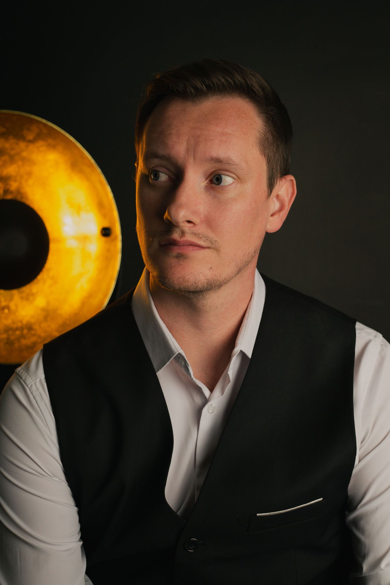 Male posing in dramatic  elegant studio portrait with in Phoenix AZ.