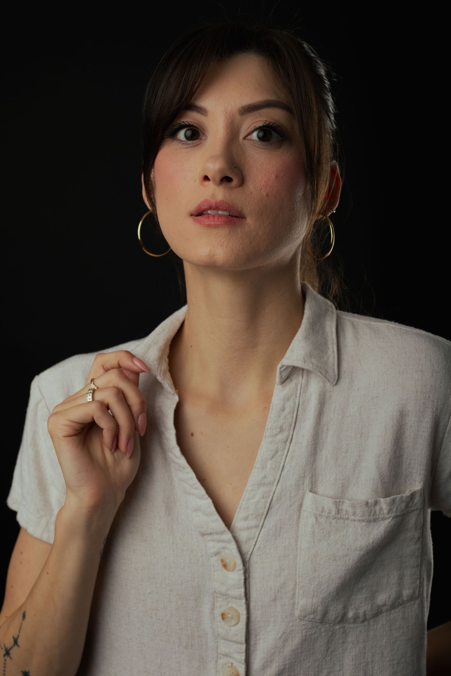 Female model posing in elegant studio portrait session in Phoenix Arizona