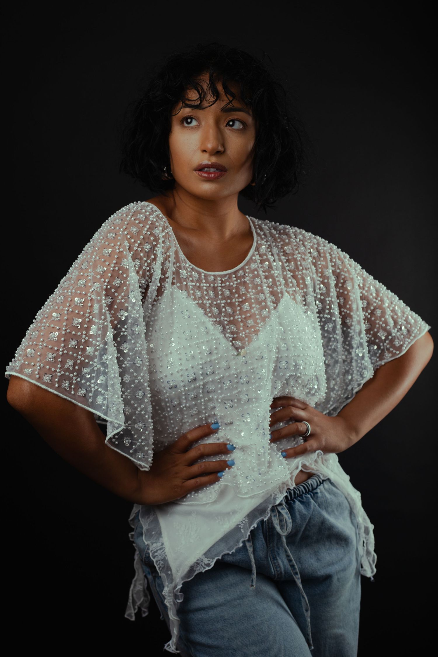 Female model posing in elegant studio portrait session in Phoenix Arizona