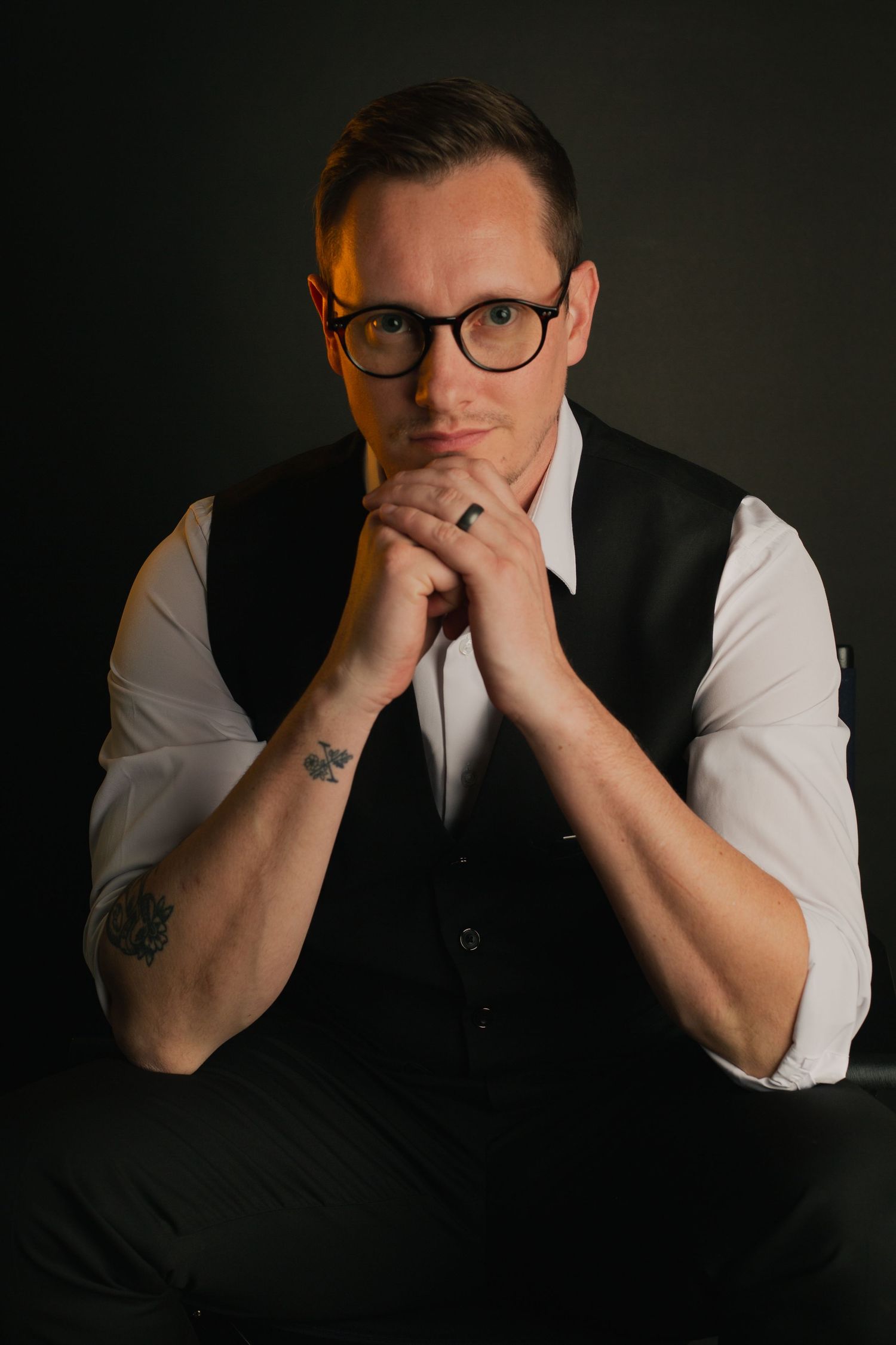 Male posing in dramatic  elegant studio portrait with in Phoenix AZ.