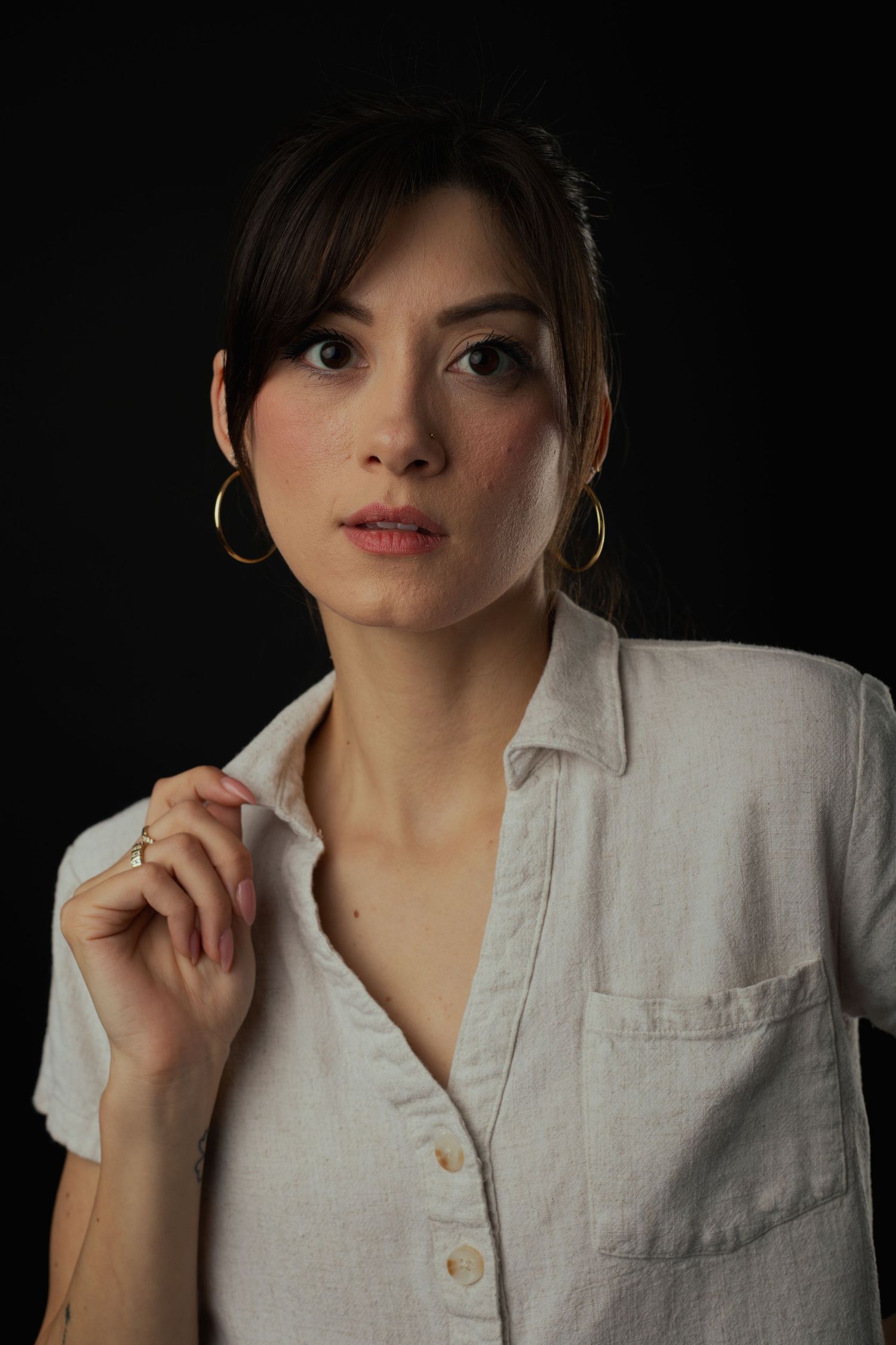 Female model posing in elegant studio portrait session in Phoenix Arizona