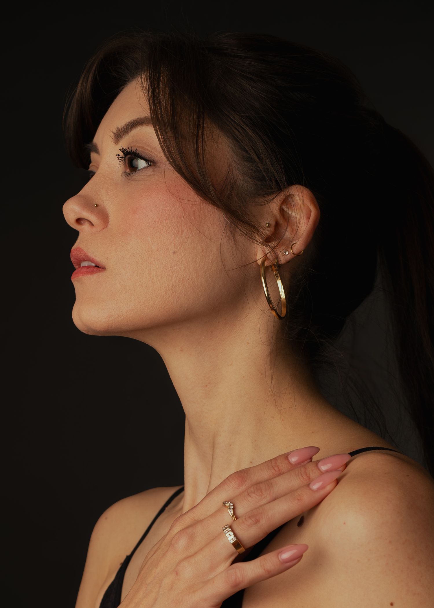 Female model posing in elegant studio portrait session in Phoenix Arizona
