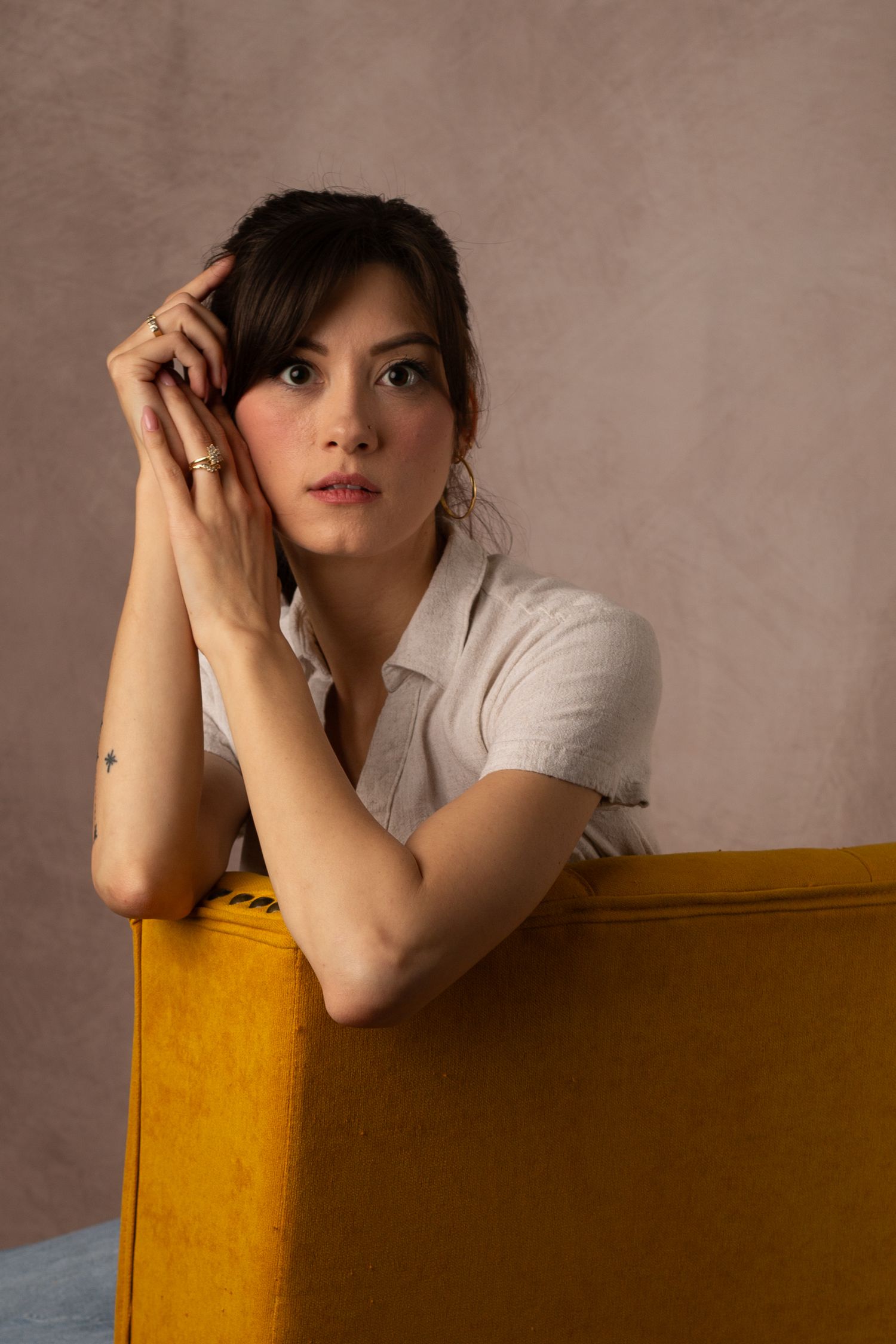 Female model posing in elegant studio portrait session in Phoenix Arizona