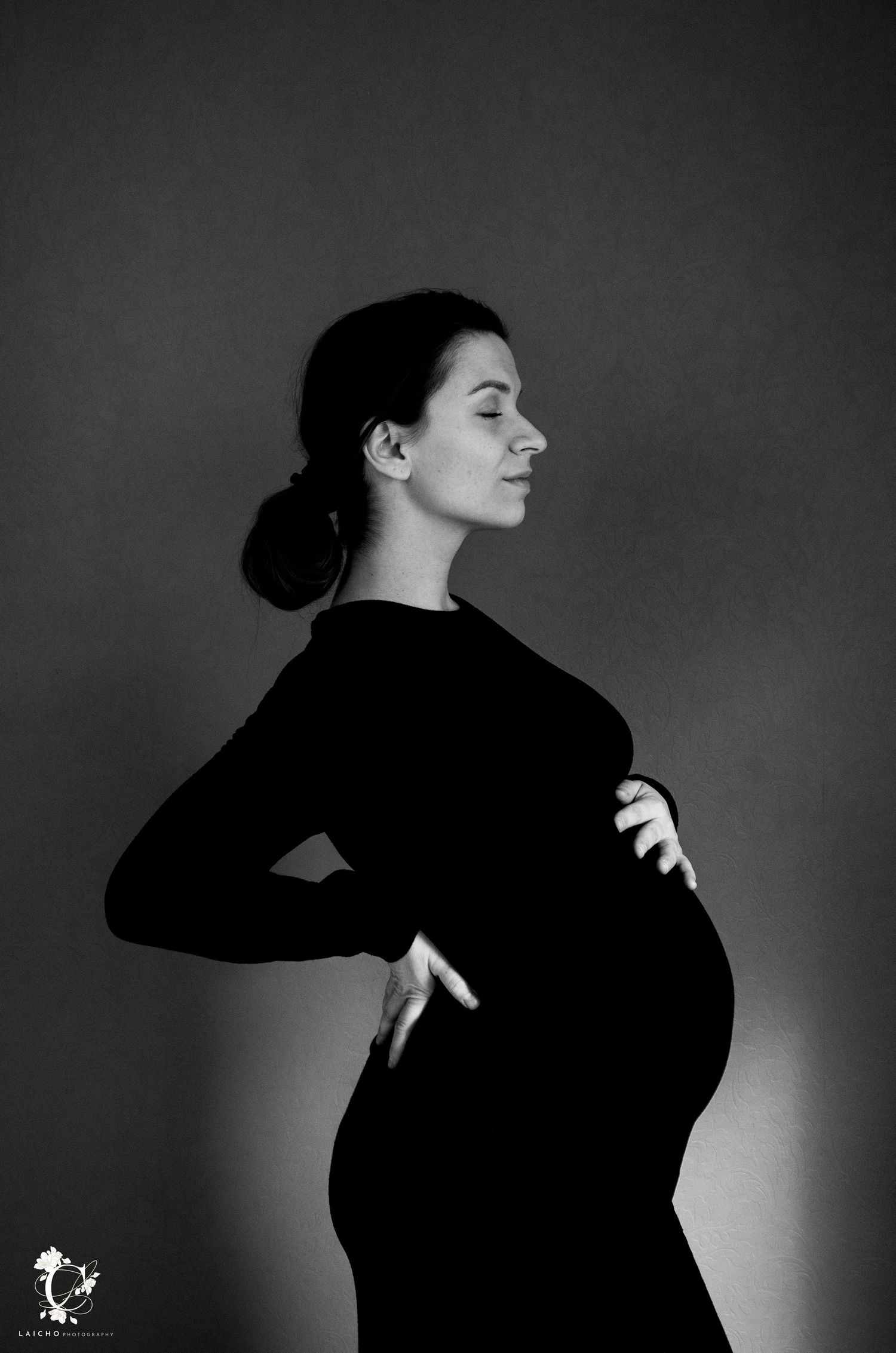 Artistic black and white portrait series showing silhouetted figure in dramatic poses against dark background.