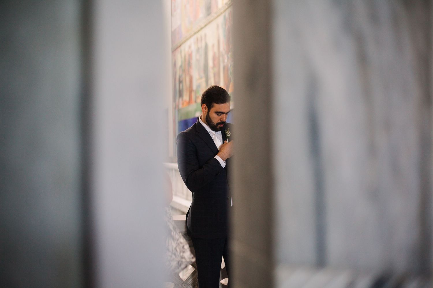 Artistic sequence of silhouettes against a blurred gray background.