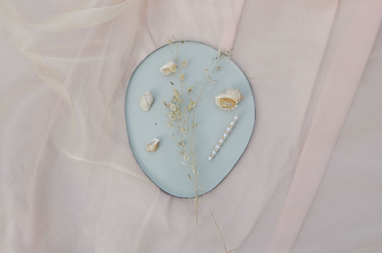 Light blue decorative plates with gold accents on white background.
