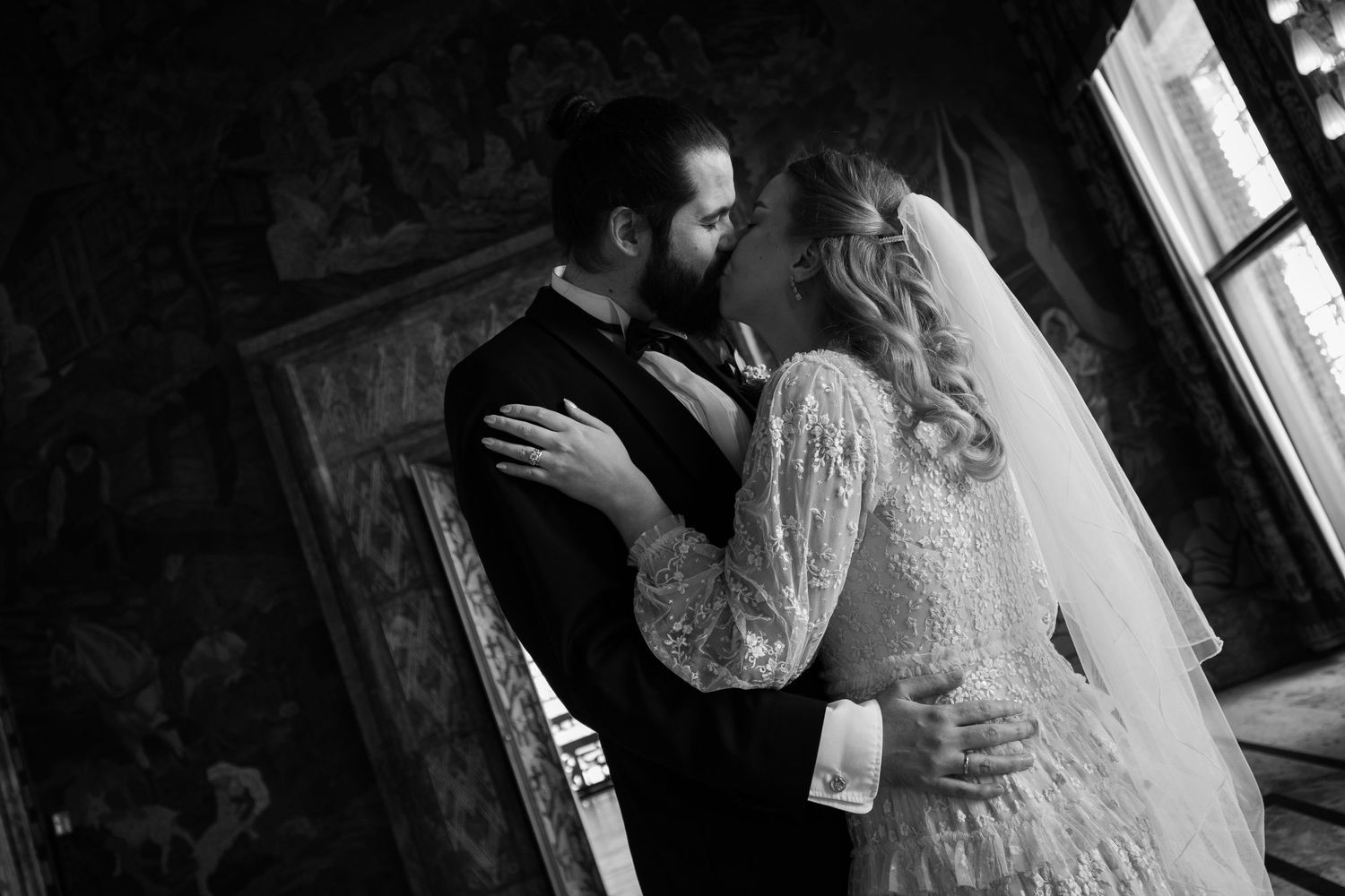 Black and white photo sequence showing a couple dancing together in a romantic moment.