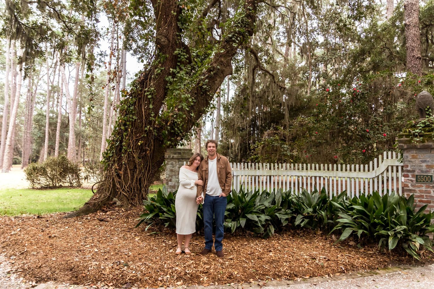A series of five outdoor garden scenes showing lush landscaping with trees, picket fences, and natural pathways.