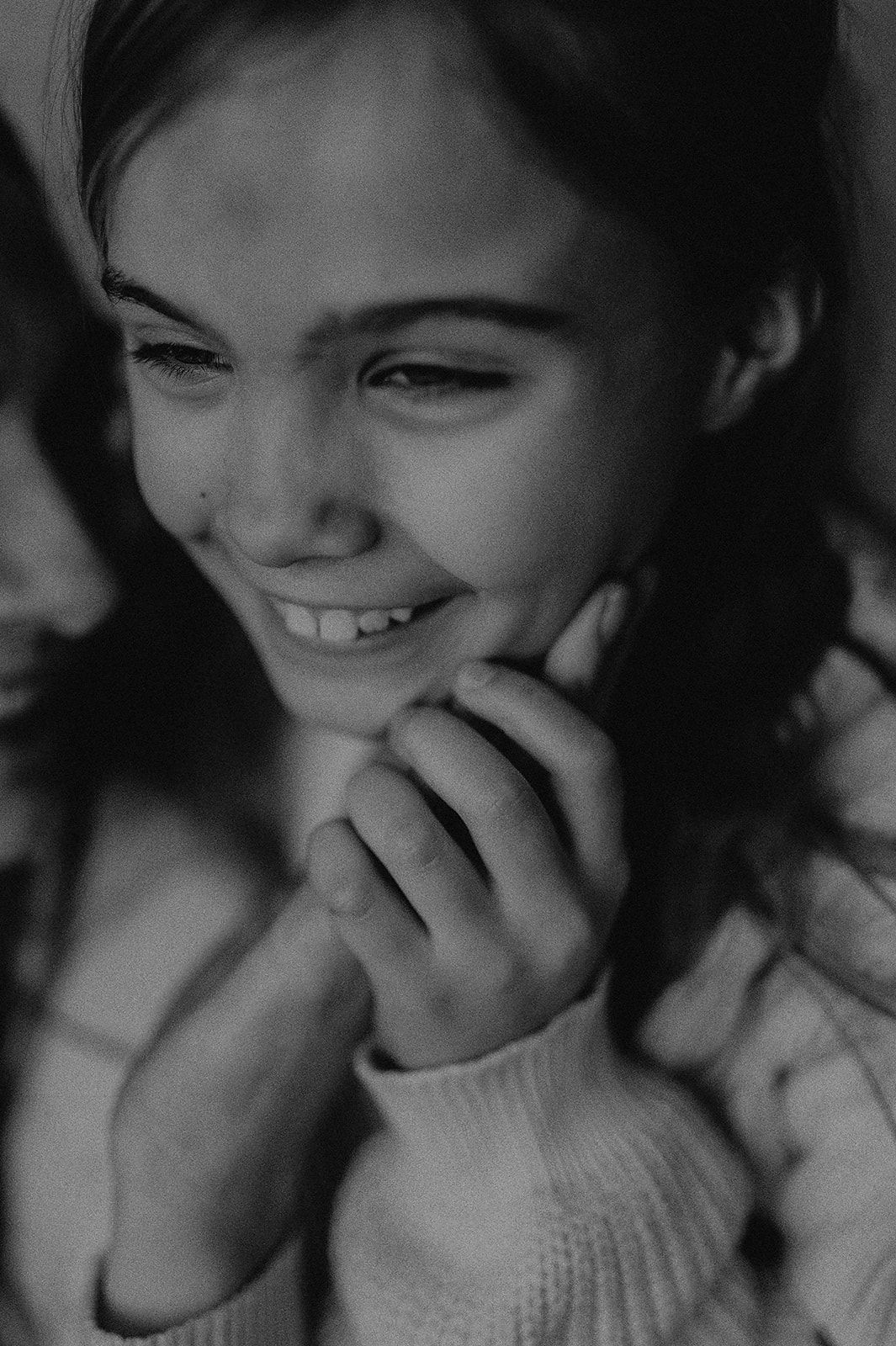 Series of candid black and white photos showing genuine laughter and happiness.