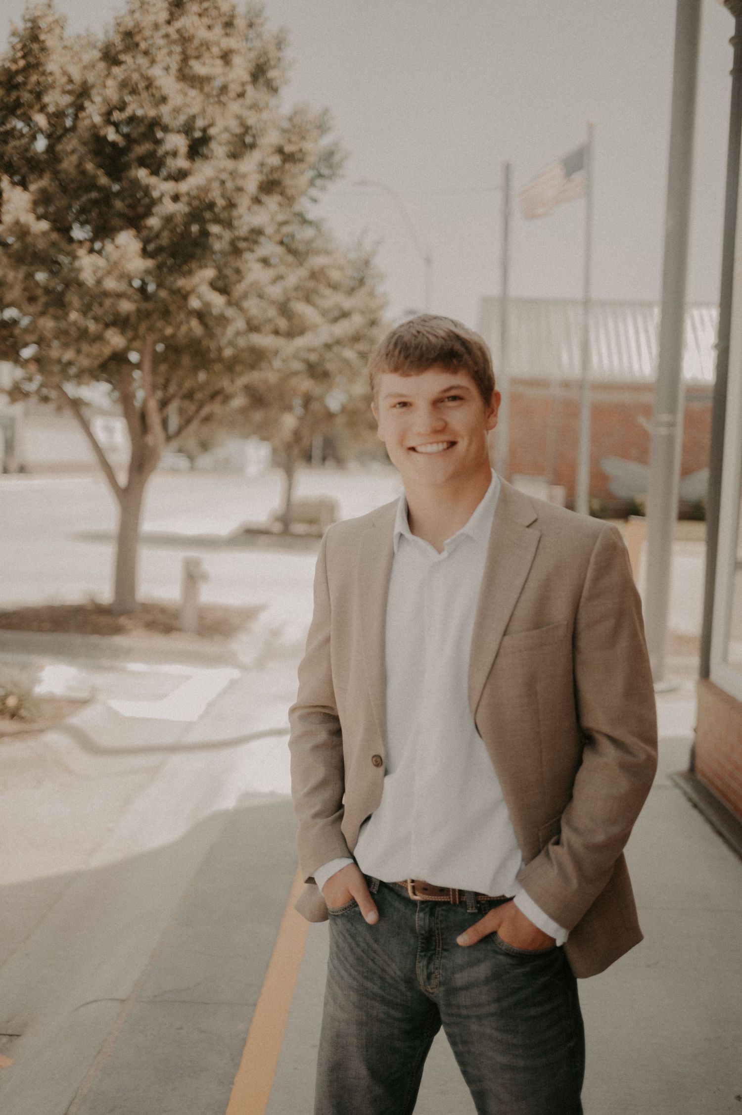 A series of five vintage-style photos showing someone in a brown blazer and jeans posing casually on a sidewalk.