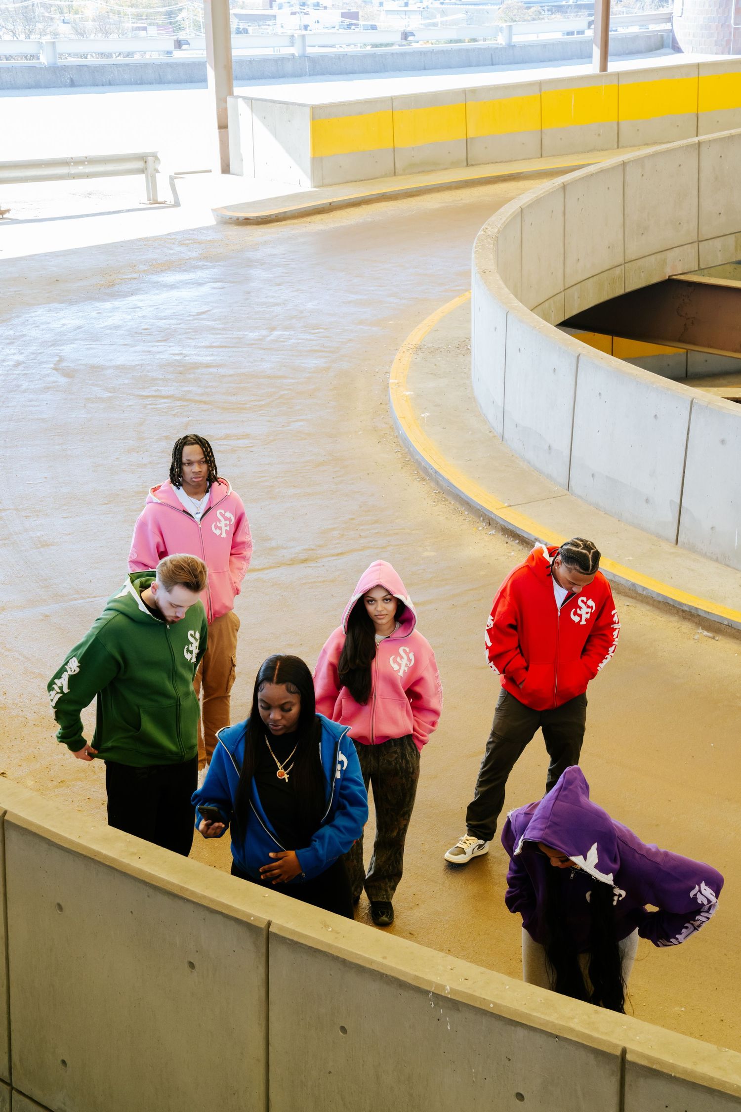 Multiple images showing people walking down a curved ramp in casual attire. Boston MA photographer, Malden MA and Greater Boston Area.