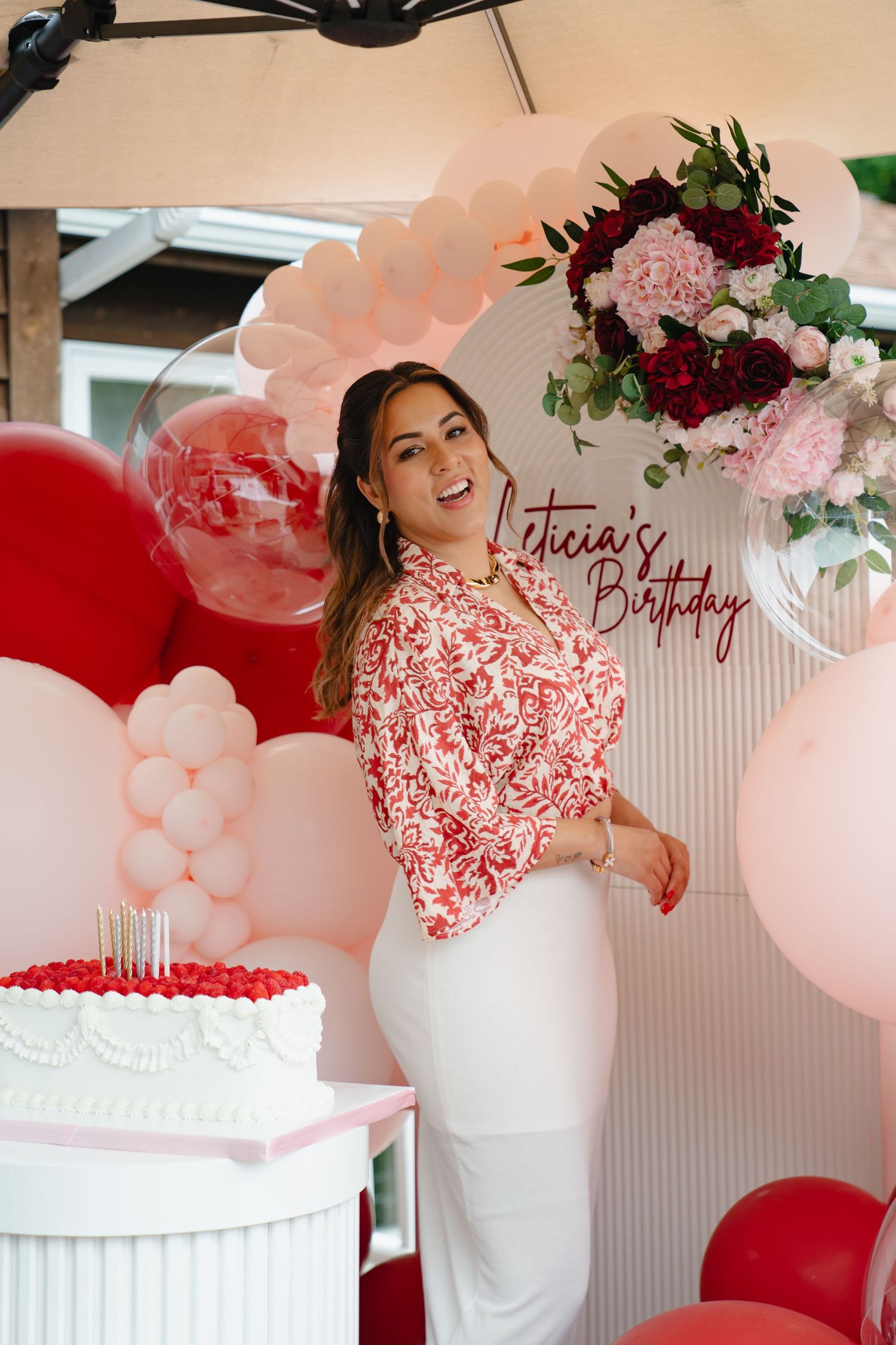 Festive party setup with pink and white balloons, floral arrangements. Boston MA photographer, Malden MA and Greater Boston.