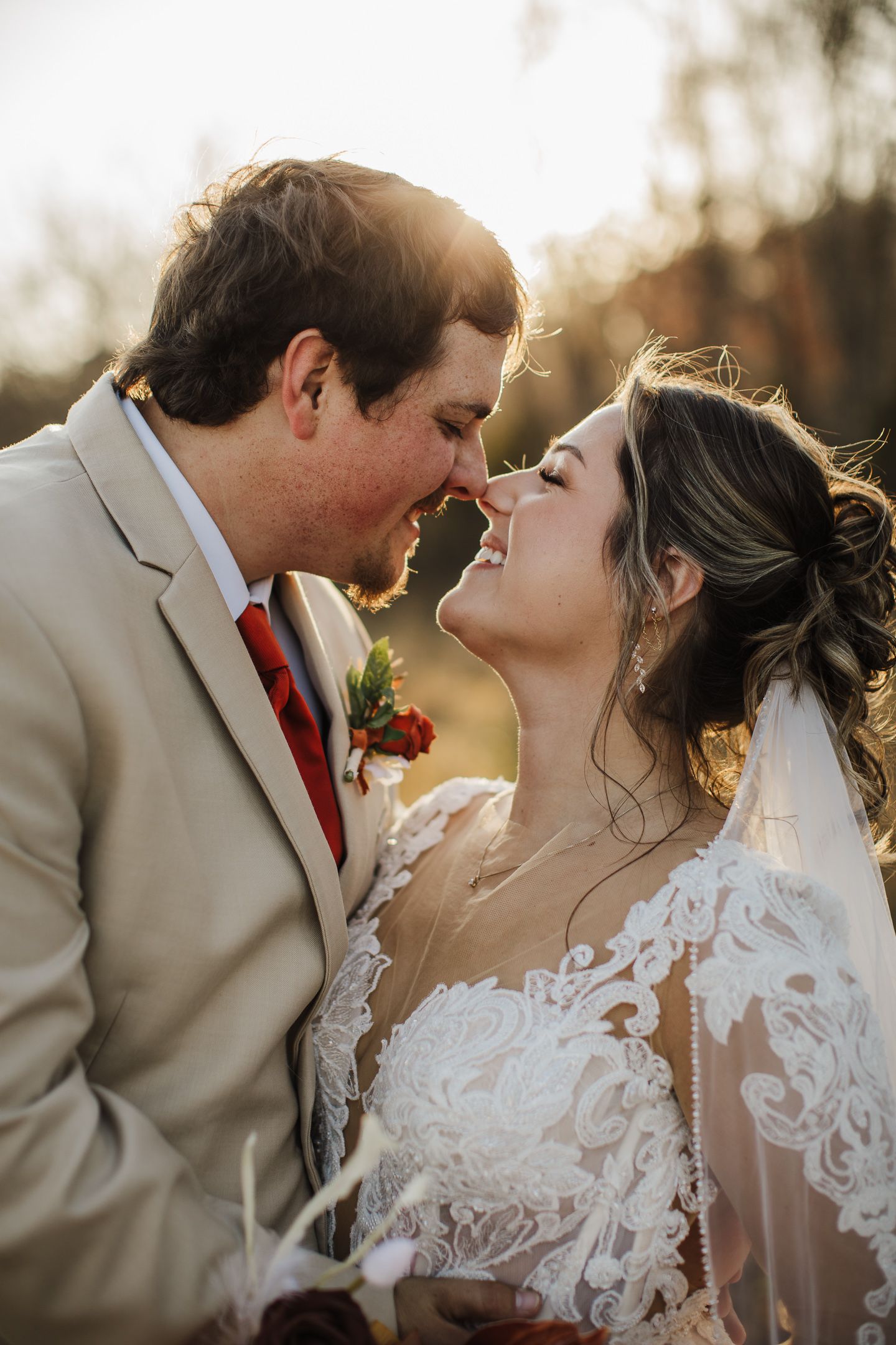 Romantic sunset wedding photography showcasing intimate moments and elegant bridal attire.