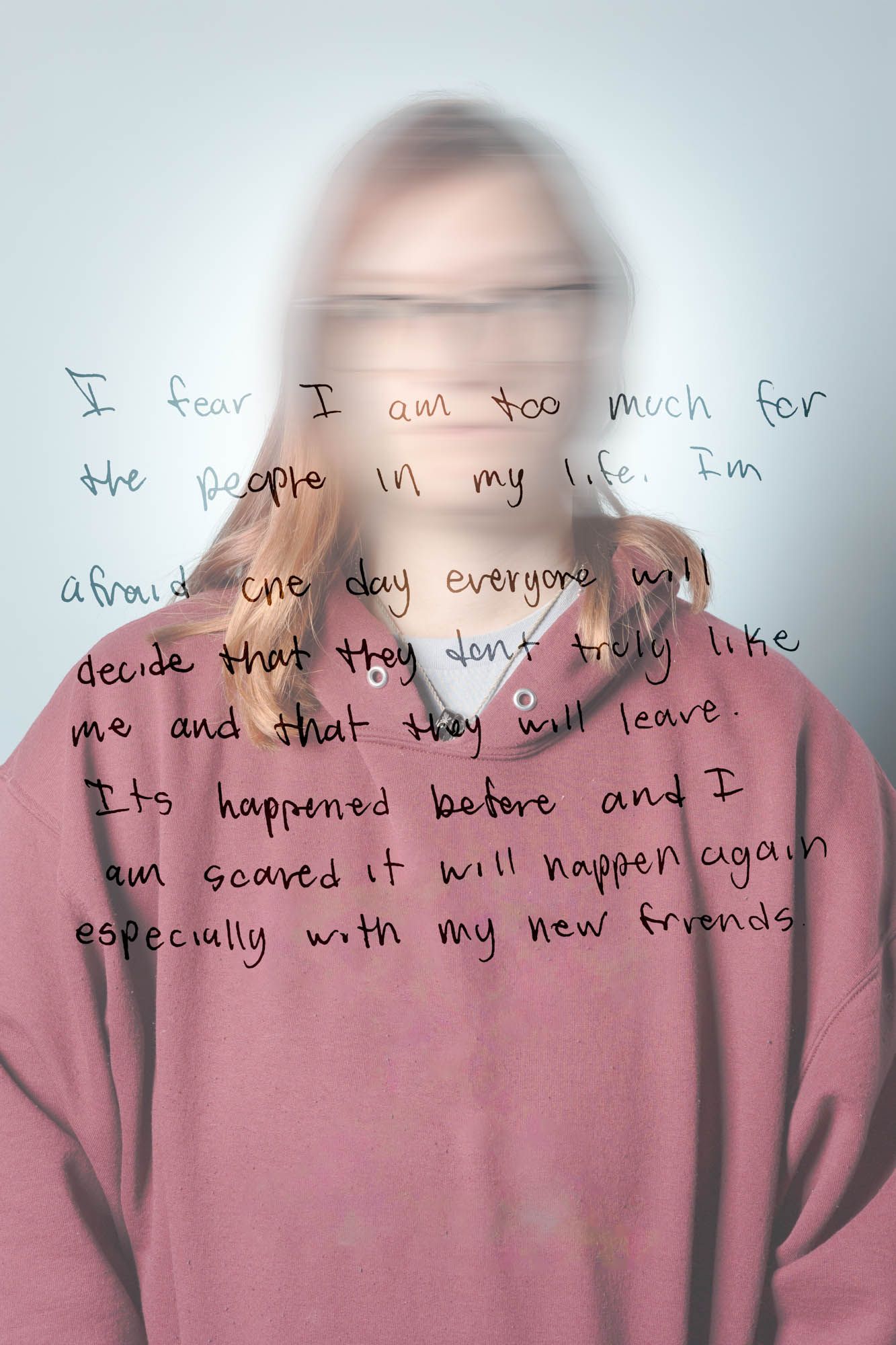 Blurred portrait of a young woman with handwritten text about fear of abandonment by friends.