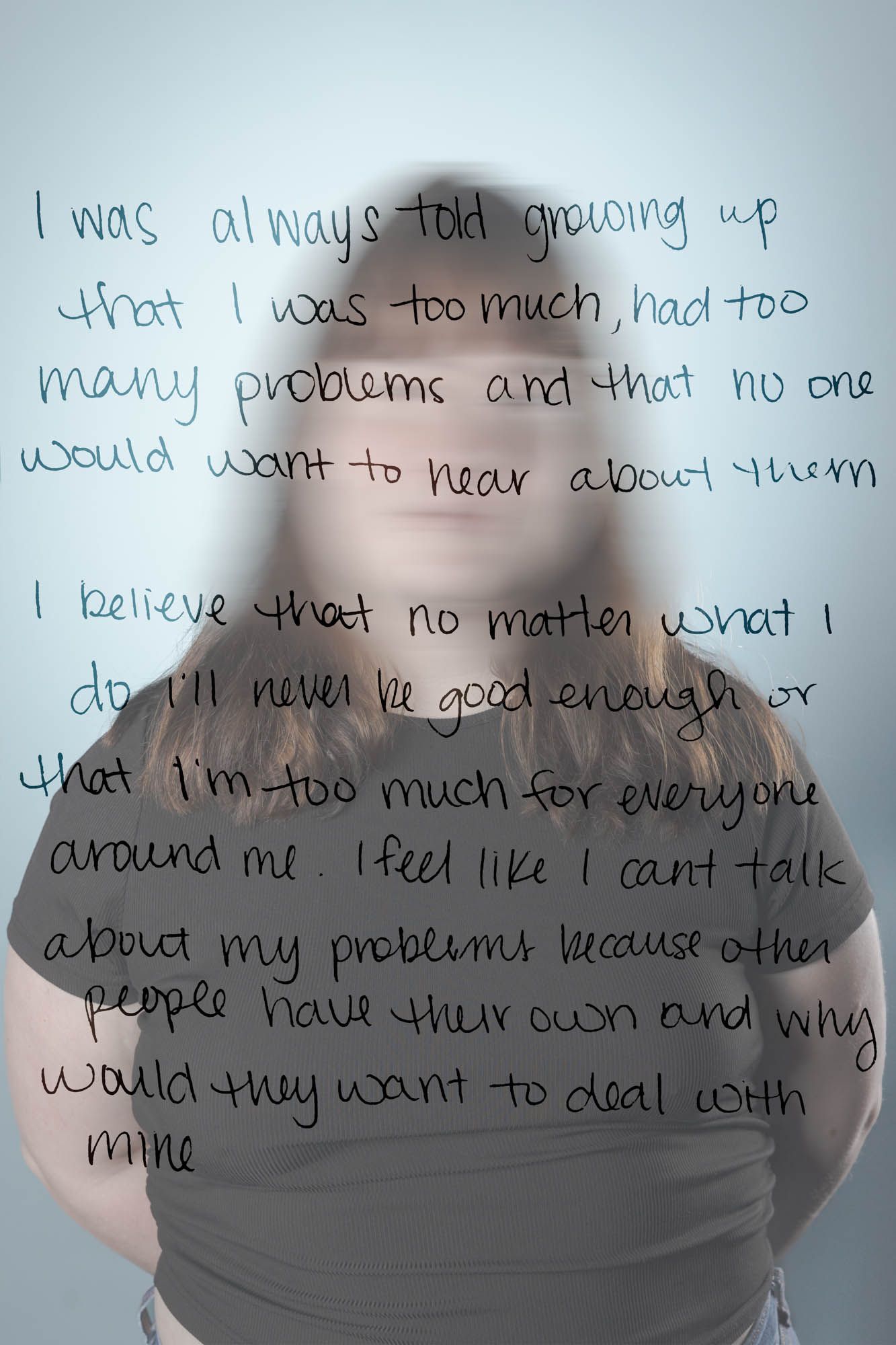 Blurred portrait of a woman with handwritten text about being told she was too much growing up.
