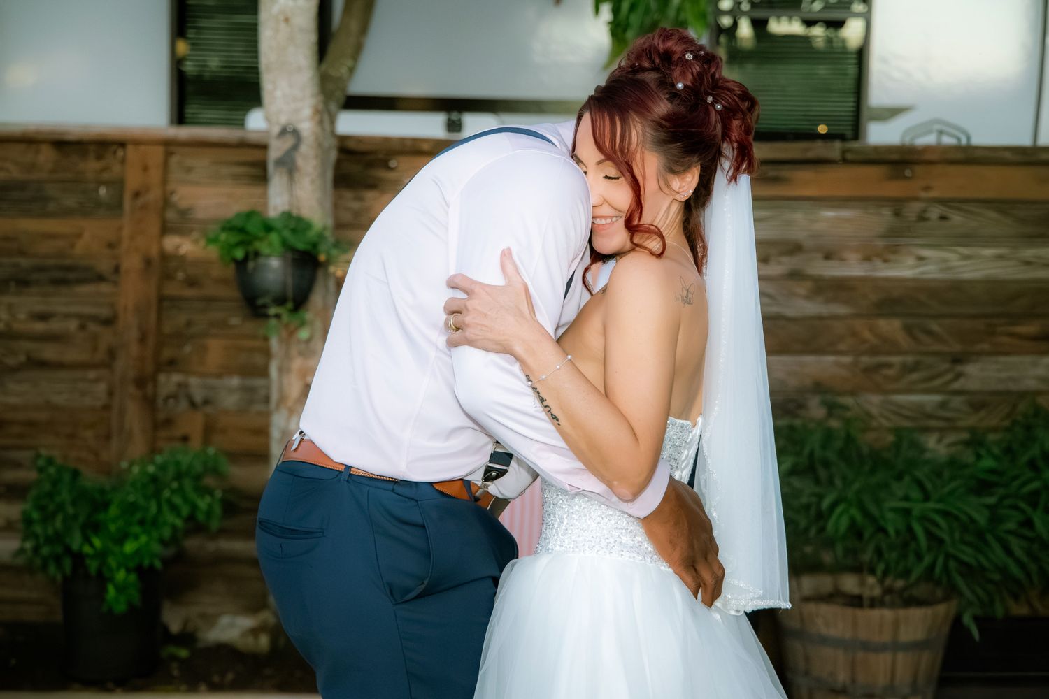 A romantic sequence of wedding photos showing intimate moments between newlyweds in an outdoor garden setting.