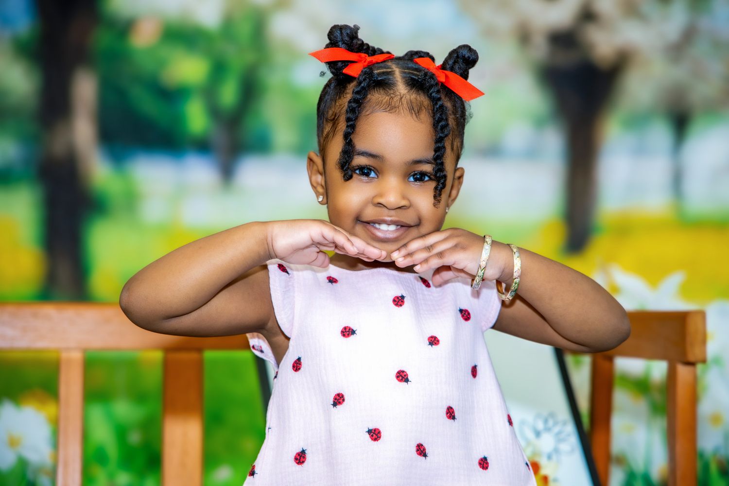 A collage of five photos showing a young person in a red bow against colorful outdoor backgrounds.