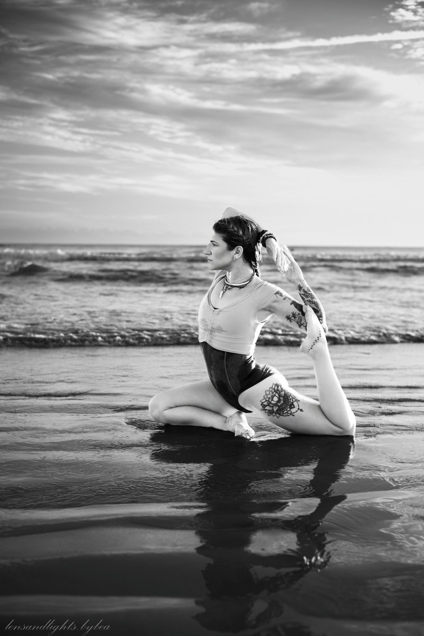 Black and white photos of beach yoga poses with waves in background.
