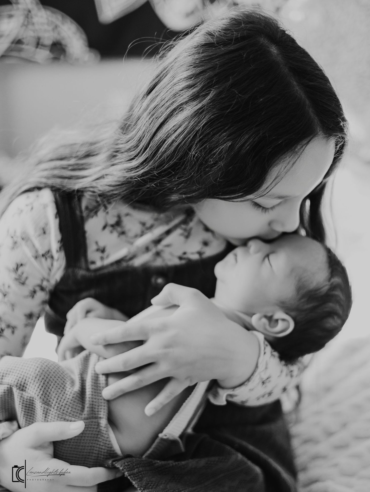 A series of black and white romantic photographs showing a couple embracing and kissing in an intimate moment.